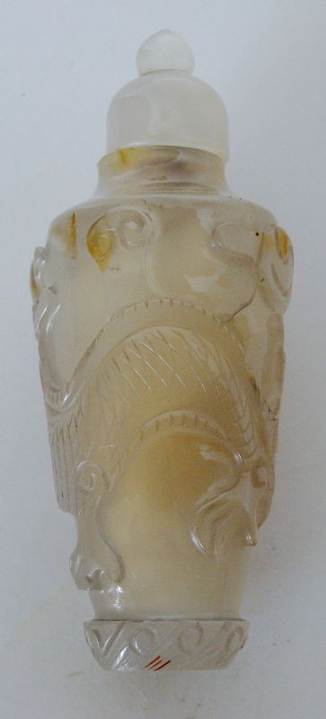 Carved Chalcedony Snuff Bottle with Stopper