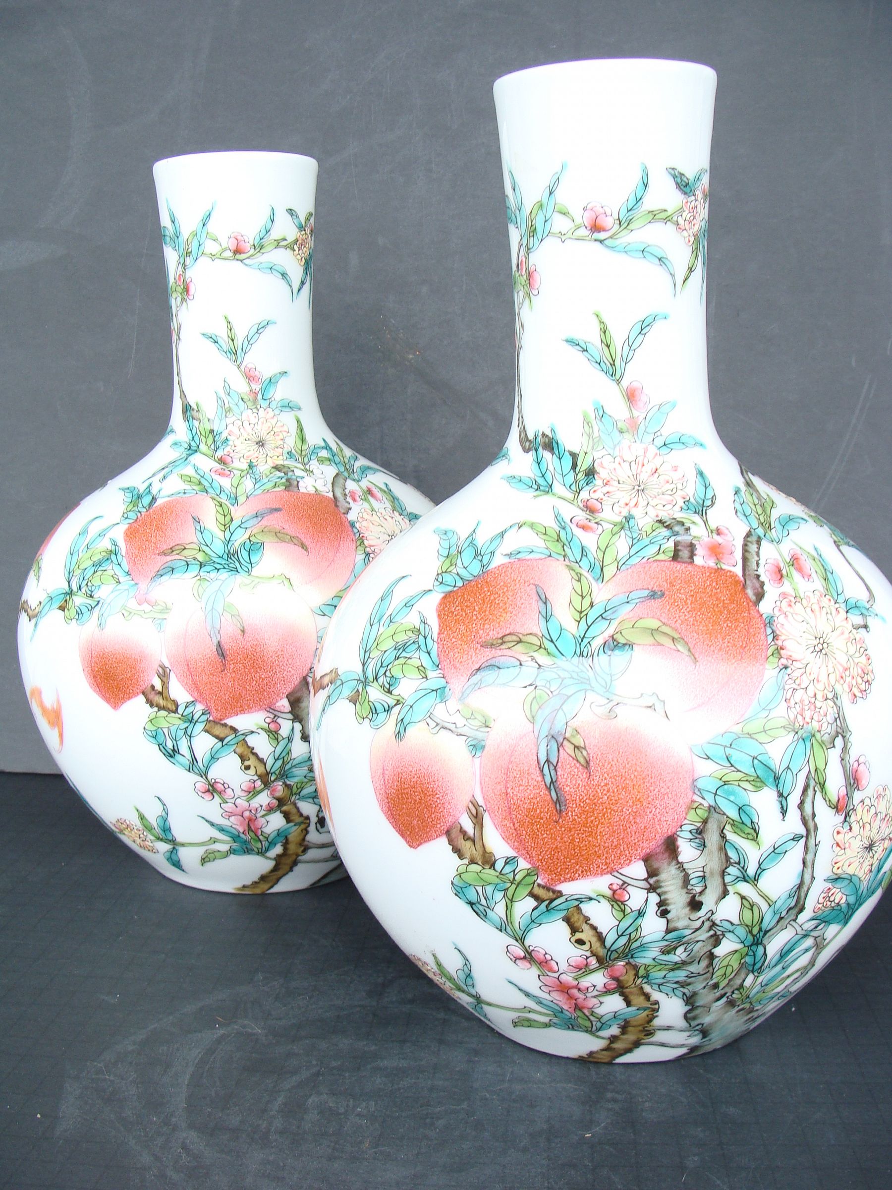 Famille Rose Nine Peach Vases