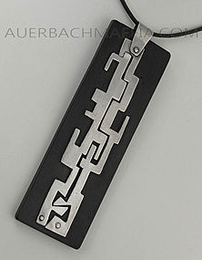 Modernist Sterling and Ebony Abstract Figural Pendant
