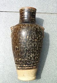 A Chinese mottled brown glazed stoneware baluster vase.