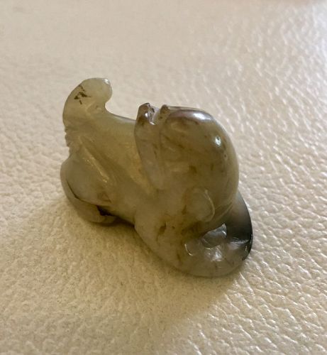 Old white jade lion dog