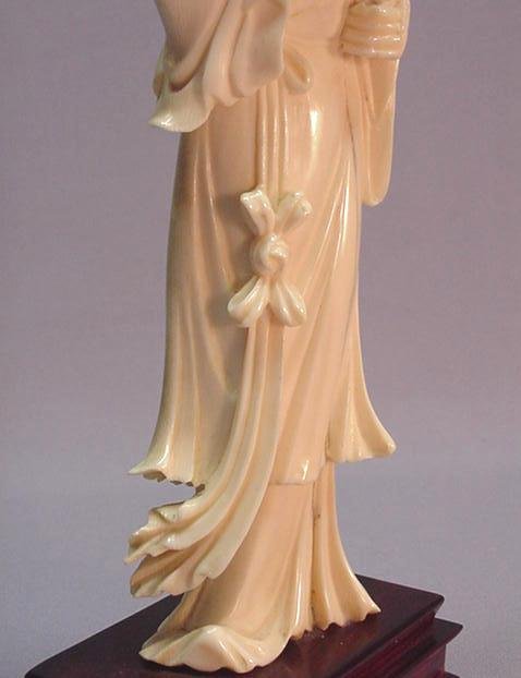 CHINESE IVORY CARVING OF A MAIDEN AND A CRANE