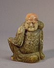 CHINESE SEAL STONE CARVING OF A MERCHANT