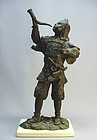 JAPANESE CAST METAL FIGURE OF A YOUNG SOLDIER