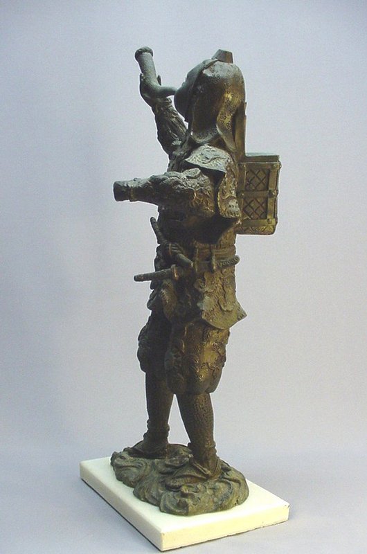 JAPANESE CAST METAL FIGURE OF A YOUNG SOLDIER