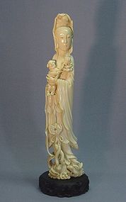 CHINESE IVORY CARVING OF GUAN YIN WITH CHILD