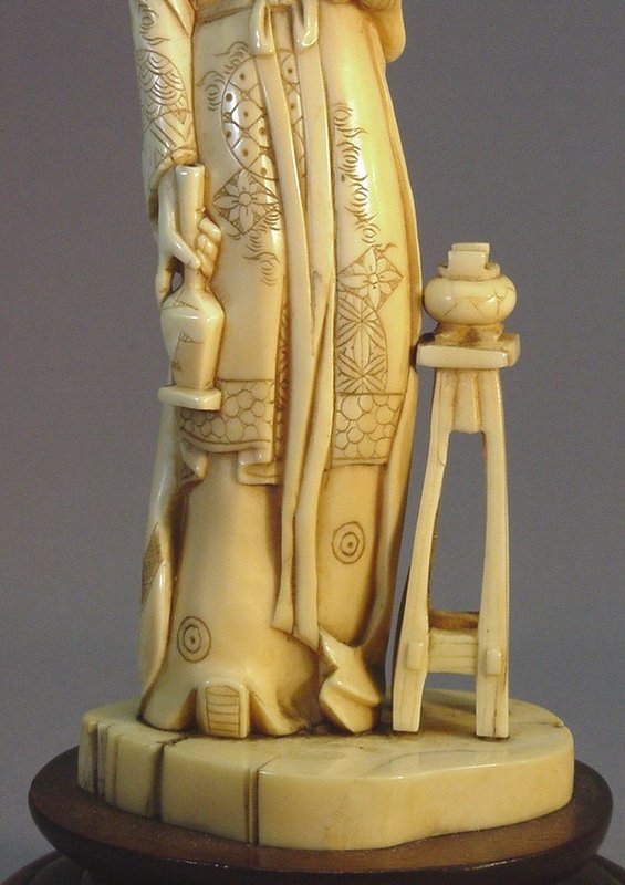 JAPANESE WALRUS TUSK CARVING OF A YOUNG LADY