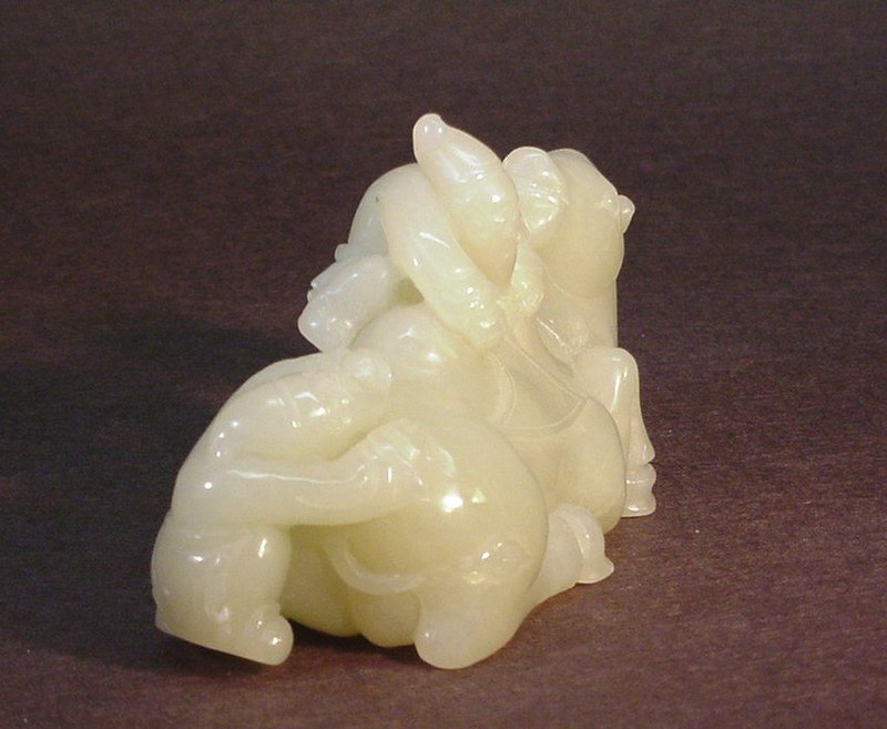 CHINESE JADE CARVING OF A CAMEL AND THREE GROOMS