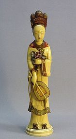 JAPANESE POLYCHROME IVORY CARVING OF A FEMALE FIGURE