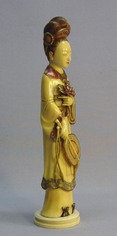 JAPANESE POLYCHROME IVORY CARVING OF A FEMALE FIGURE