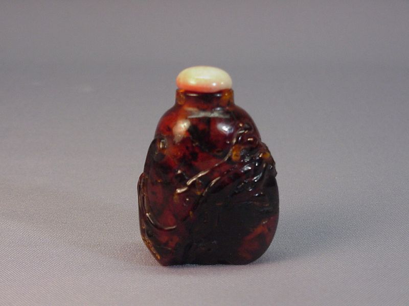 Old Chinese carved amber snuff bottle
