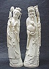 A PAIR OF CHINESE CARVED IVORY STATUES