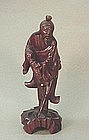 CHINESE CARVED WOOD STATUE OF A FISHERMAN