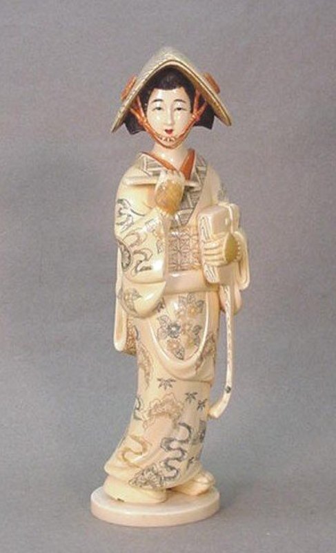 JAPANESE 20TH CENTURY CARVED IVORY OKIMONO OF A GEISHA