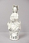 CHINESE PORCELAIN GUAN-YIN WITH CHILD