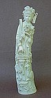 CHINESE CARVED IVORY BEAUTY HOLDING A BASKET