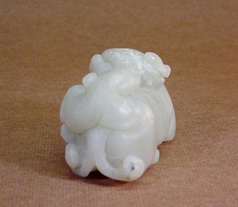 CHINESE CARVED NEPHRITE LIONESS AND CUB