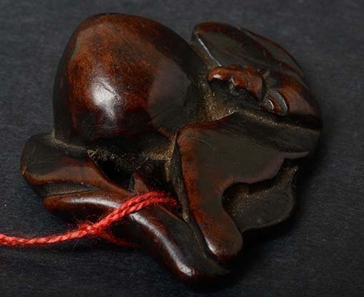 Antique Chinese Wood Toggle of Bat eating a Peach