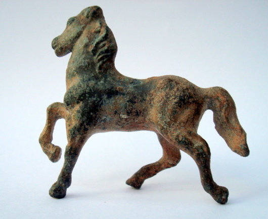 A ROMAN BRONZE FIGURE OF A HORSE