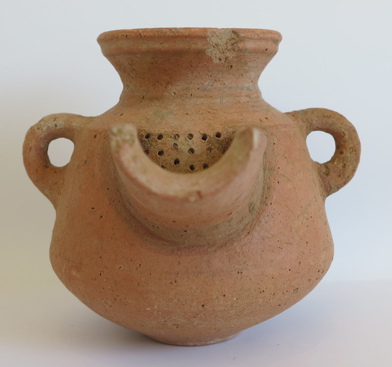 AN EXTERMELY RARE IRON AGE TERRACOTTA WINE STRAINER