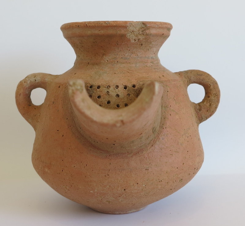 AN EXTERMELY RARE IRON AGE TERRACOTTA WINE STRAINER