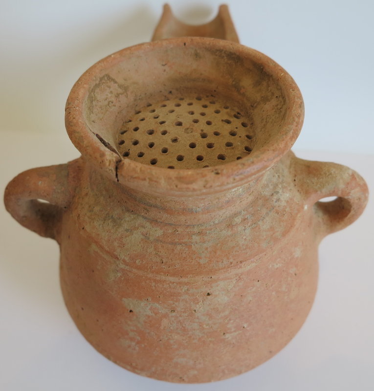 AN EXTERMELY RARE IRON AGE TERRACOTTA WINE STRAINER