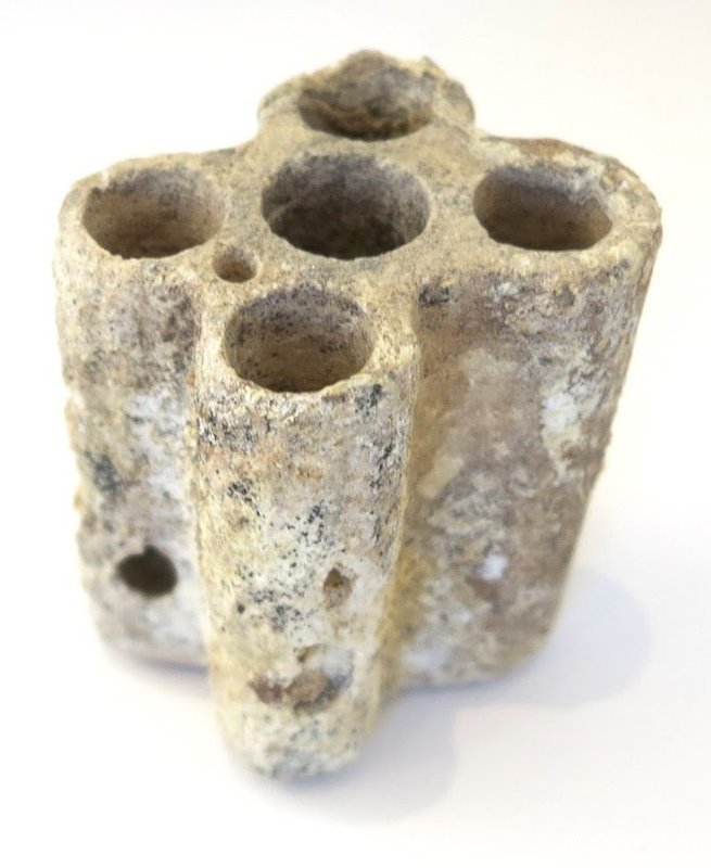 AN EGYPTIAN LIMESTONE QUINTUPLE KOHL TUBE