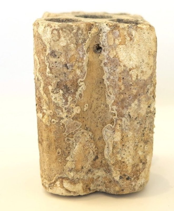 AN EGYPTIAN LIMESTONE QUINTUPLE KOHL TUBE