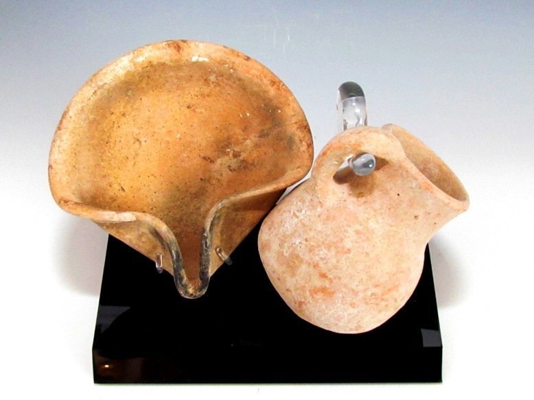 AN ISRAELITE CLAY OIL LAMP AND JUGLET SET