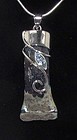 A ROMAN GLASS HANDLE FRAGMENT IN SILVER PENDANT WITH STONE