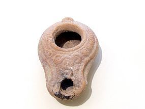A BEIT NATIF TERRACOTTA OIL LAMP FROM THE HOLY LAND