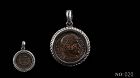A ROMAN BRONZE COIN OF CONSTANTINE THE GREAT IN SILVER PENDANT