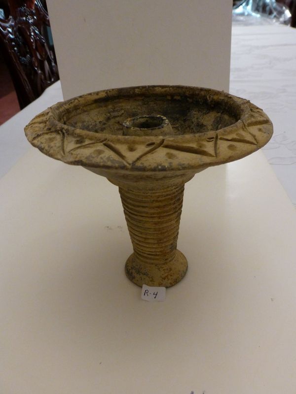 A JUDAEAN TERRACOTTA TORCH