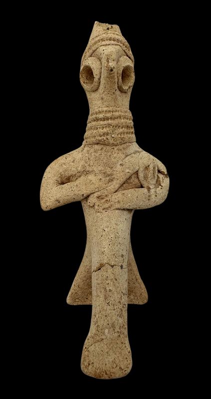 A SYRO-HITTITE TERRACOTTA FIGURE OF A DEITY