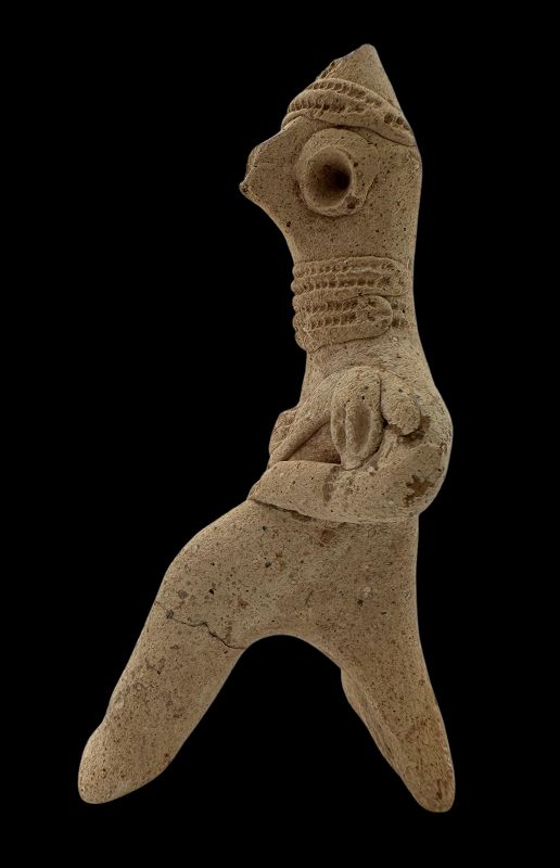 A SYRO-HITTITE TERRACOTTA FIGURE OF A DEITY