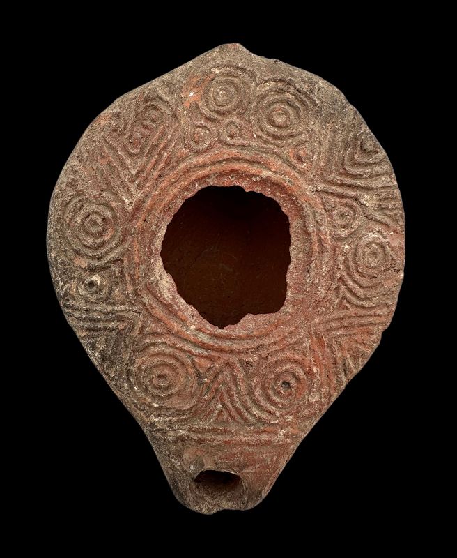 A SAMARITAN TERRACOTTA OIL LAMP FROM THE HOLY LAND