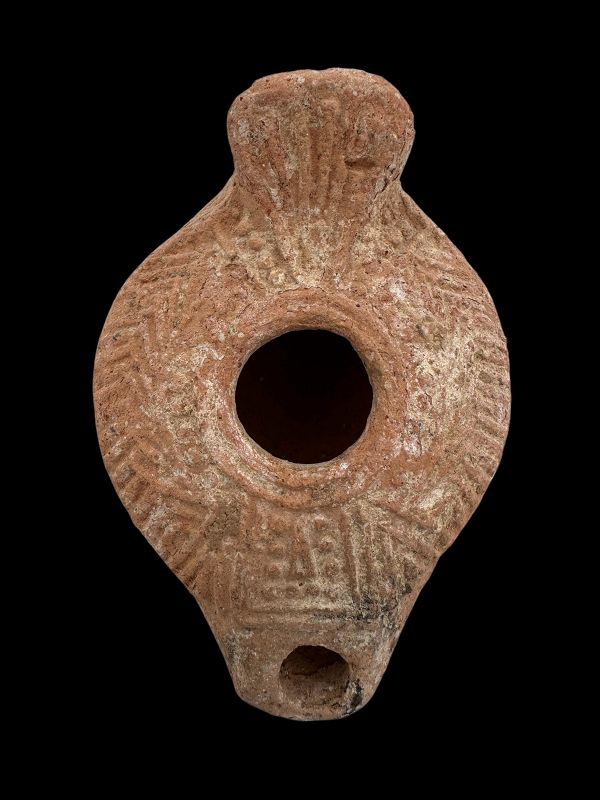 A SAMARITAN TERRACOTTA OIL LAMP