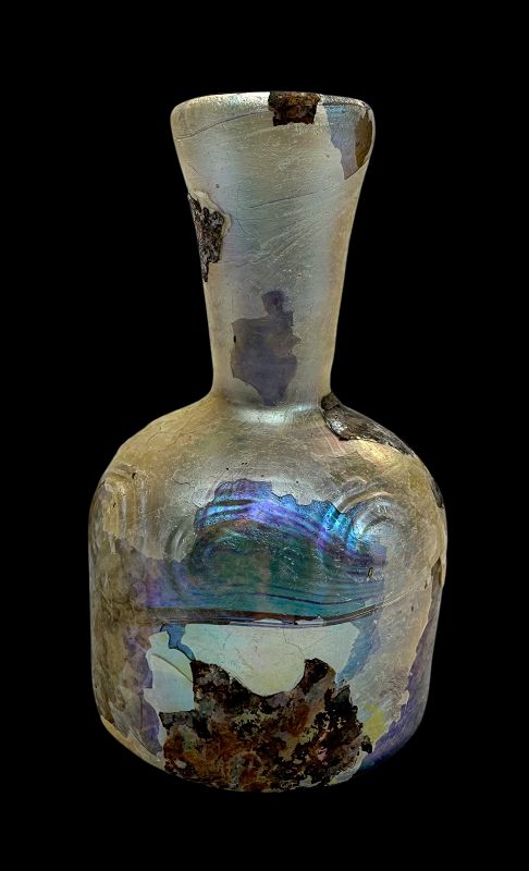 A ROMAN GLASS BOTTLE