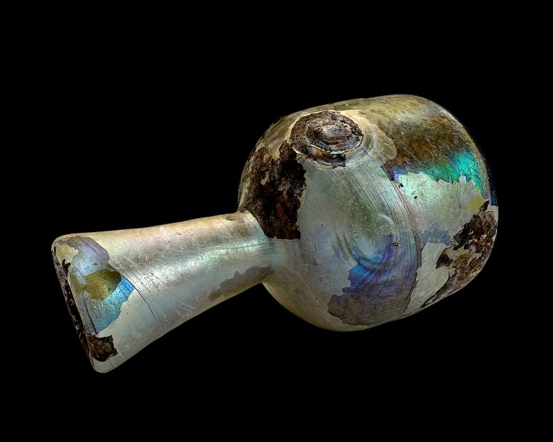 A ROMAN GLASS BOTTLE