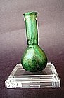 AN EARLY ROMAN GLASS PERFUME FLASK
