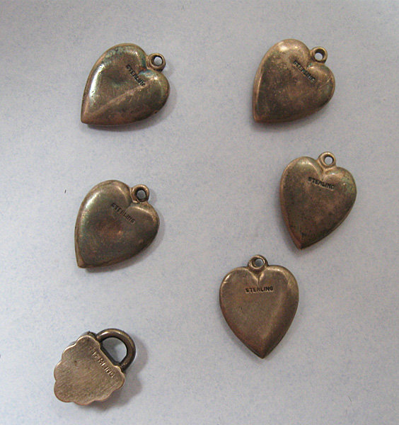 Six American Sterling Charms