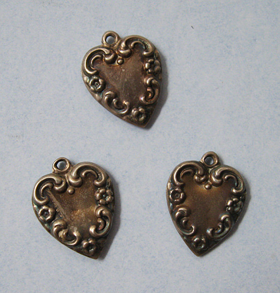 Six American Sterling Charms