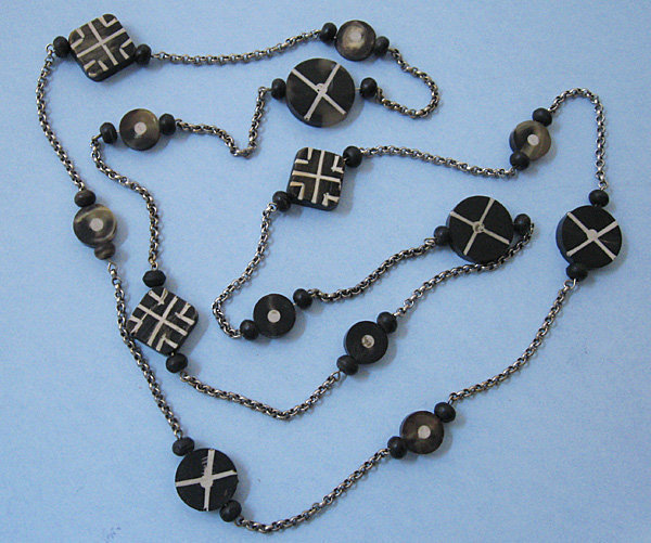 Chain Necklace with Primitive Ornaments