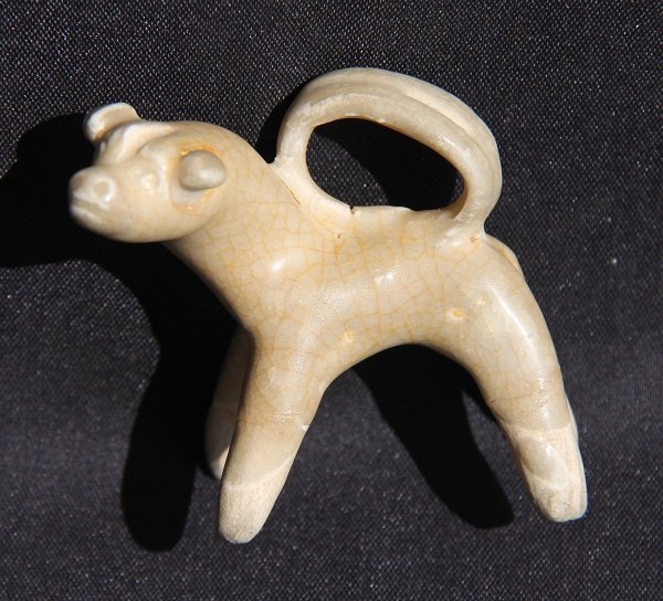 Yuan Miniature Dog Figurine