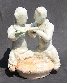 YUAN QINGBAI MAN AND LADY FIGURINE