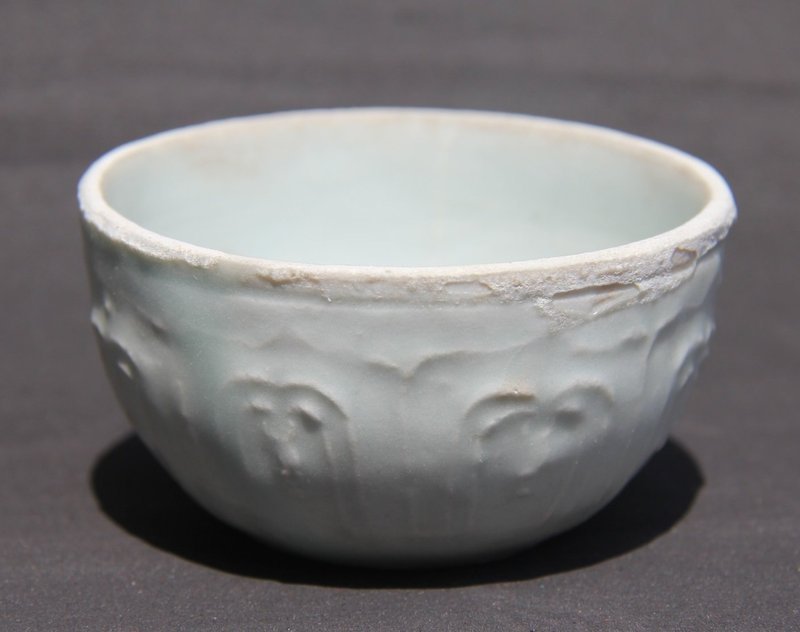 YUAN QINGBAI CUP WITH INCISED PETAL PANELS DEOCATIONS K15/173