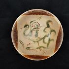 TANG CHANGSHA BOWL WITH CHARMING BIRD MOTIF