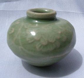 Fine Yuan Celadon Jar with Flower Decoration