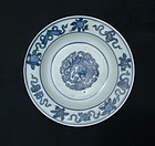 A Fine Ming Blue and White Dish with Mythical Beast