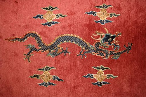 Embroidered Ming Dynasty silk dragon and clouds patches